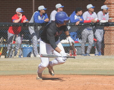 batter hitting a ball during a game